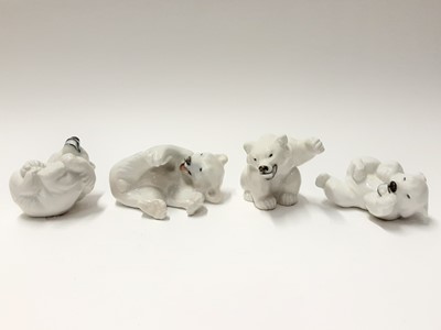 Lot 156 - Eight Royal Copenhagen porcelain polar bears, model numbers 1107, 232, 072, 233, 245 (the largest looks like number 409)
