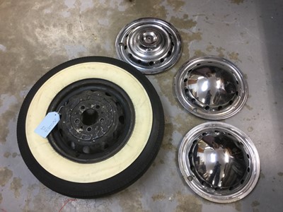 Lot 1258 - Rare 1930s Cord 810/812 steel wheel with new Goodrich 6.50 x 16 white wall tyre, some hubcaps and other Cord spares - from a 1937 Cord 812 Sedan