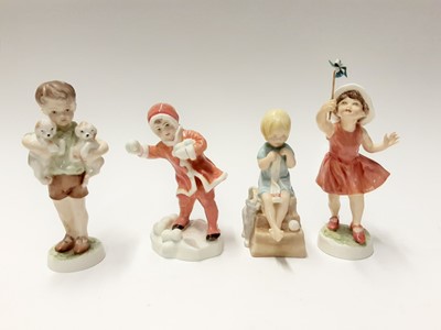 Lot 203 - Seven Royal Worcester figures - Three's Company, The Slide, Katie, Fisherman, Snowball, Christopher and Let's Run