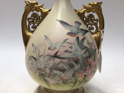 Lot 1119 - Large Royal Worcester blush ivory vase finely painted with swallows