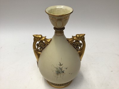 Lot 1119 - Large Royal Worcester blush ivory vase finely painted with swallows
