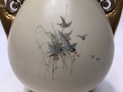 Lot 1119 - Large Royal Worcester blush ivory vase finely painted with swallows