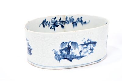 Lot 1 - Lowestoft oval potting pot, with moulded florets alternating with scrolled panels painted in blue with a fisherman beneath a willow tree