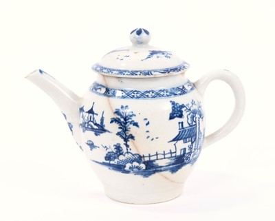 Lot 12 - Lowestoft teapot and cover, of globular form with a straight spout and button finial, painted in blue with a Chinese landscape, 10.7cm high