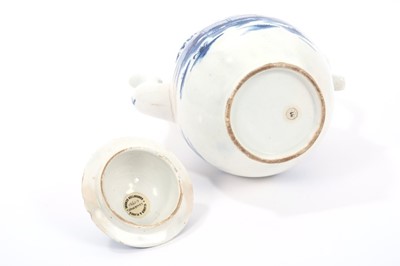 Lot 19 - Lowestoft coffee pot and cover, with a curved spout and button finial, painted in blue with a Chinese river scene within diaper borders, 23.5cm high