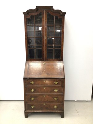 Lot 13 - Georgian style walnut crossbanded bureau bookcase