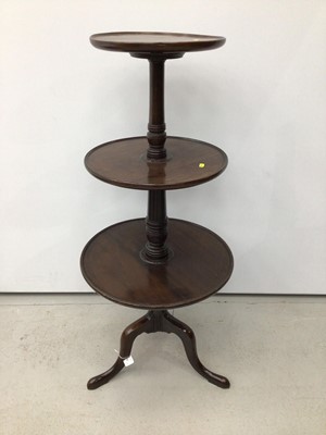 Lot 64 - George III mahogany three tier dumb waiter, three dished circular tiers on tripod base, 110cm high