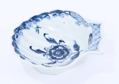 Lot 29 - Lowestoft pickle dish, of scallop shell form, painted in blue with a chrysanthemum within a scrolled border, 10.8cm long