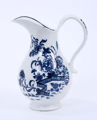 Lot 36 - Lowestoft ewer, of pear shape with a high scrolled handle, printed in blue with the Fence pattern, crescent mark, 14cm high