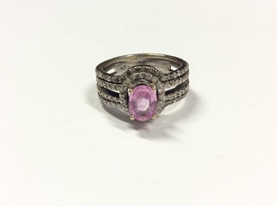 Lot 519 - 18ct white pink topaz and diamond ring. Size L½