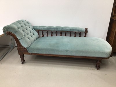 Lot 68 - Victorian mahogany chaise longue, with blue velvet button upholstery on castors
