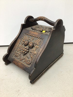 Lot 87 - Early 20th century carved oak purdonium, 42cm high, together with an oak bookcase (previously a revolving bookcase. (2)