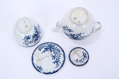 Lot 45 - Lowestoft Mansfield pattern teapot and sucrier, both with flower finials, the teapot of globular form with crescent mark and 13.3cm high, the sucrier 12.3cm high