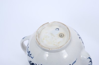 Lot 45 - Lowestoft Mansfield pattern teapot and sucrier, both with flower finials, the teapot of globular form with crescent mark and 13.3cm high, the sucrier 12.3cm high