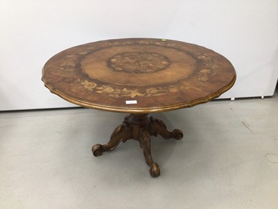Lot 127 - 19th century style Italian floral marquetry inlaid coffee table with shaped oval top on turned pedestal with four carved scroll legs