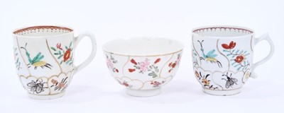 Lot 53 - Lowestoft coffee cup and tea bowl, painted with various insects and flower sprigs within gilded compartments, and a Worcester coffee cup of the same pattern (3)
