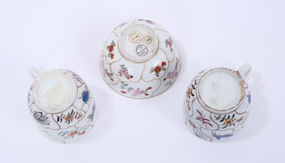 Lot 53 - Lowestoft coffee cup and tea bowl, painted with various insects and flower sprigs within gilded compartments, and a Worcester coffee cup of the same pattern (3)