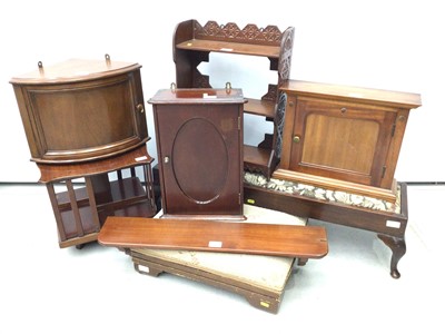 Lot 135 - Small group of furniture to include an Edwardian walnut desk-top revolving bookcase, 34cm high x 37cm square, two mahogany wall mounted cupboards, two Victorian hanging shelves and two footstools