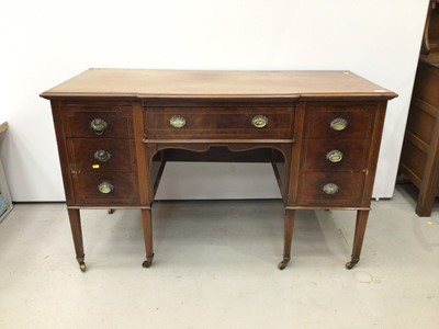 Lot 138 - Late 19th century inlaid mahogany kneehole sideboard with seven drawers on square taper legs and brass capped castors 138cm wide, 60cm deep, 83cm high