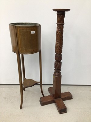 Lot 151 - Edwardian inlaid mahogany planter with brass liner on splayed legs with shaped undertier, and antique carved mahogany torchere (2)