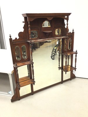 Lot 152 - Late Victorian carved walnut overmantel mirror with numerous shaped bevelled plates and turned supports, 136cm wide, 128cm high