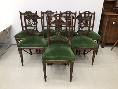 Lot 154 - Matched set of eight Edwardian carved walnut dining chairs with pierced splat back, green upholstered seats on turned front legs