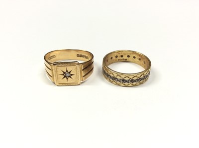 Lot 547 - 18ct gold ring set with a single stone diamond and 18ct gold diamond set textured band ring