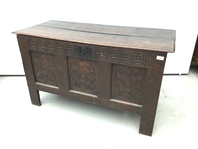 Lot 159 - Late seventeenth century carved and panelled oak coffer with candle box interior enclosed by hinged lid with original link and staple hinges, the front with carved frieze and three carved panels, 1...