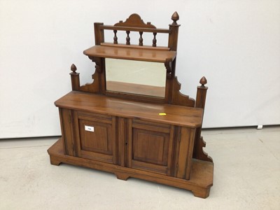 Lot 160 - Miniature Edwardian walnut mirror back sideboard with bevelled plate, two panelled doors below on bracket feet, 72cm wide, 16.5cm deep, 67cm high