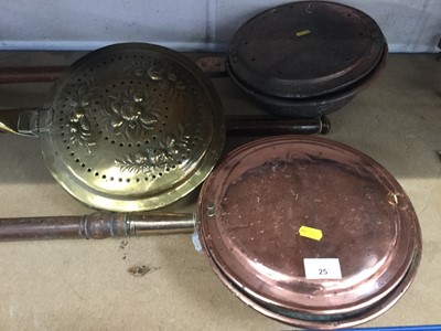 Lot 25 - Group of four antique copper and brass warming pans (4)