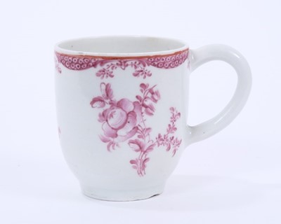 Lot 59 - Rare Lowestoft coffee cup, painted in puce monochrome with flower sprays and sprigs, a red line under the rim and an elaborate puce border below, 6.1cm high