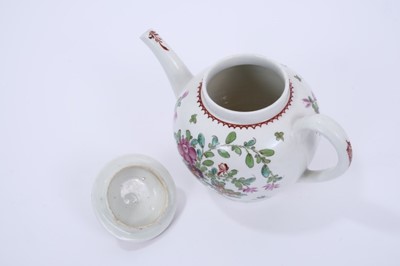 Lot 68 - Lowestoft teapot and cover, of globular form with a flower finial and curved spout, painted in Curtis style with flowers within a red line and loop border, 14cm high
