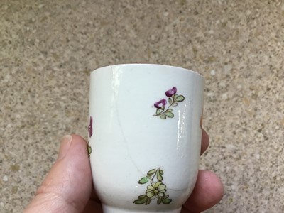 Lot 69 - Lowestoft sparrow beak jug and two coffee cups, all painted in the Tulip Painter style, the jug 8.5cm high