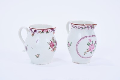 Lot 70 - Two Lowestoft sparrow beak jugs, both painted in the Curtis style with flowers, the first with a puce panel below the spout