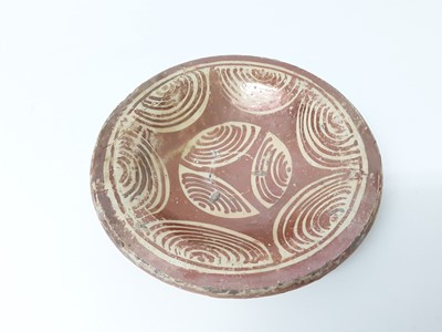 Lot 85 - Early Hispano-Moresque dish, possibly 17th century, decorated in copper lustre, 19cm diameter