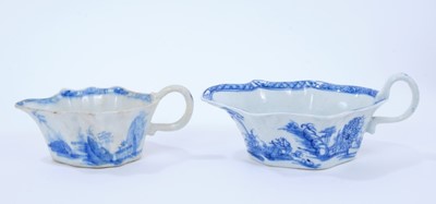 Lot 89 - Two Bow blue and white sauceboats, c.1755, both painted with the Desirable Residence pattern, 14cm and 17cm length