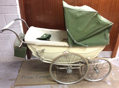 Lot 1123 - Vintage Wilson silver cross type pram in cream with a green hood