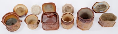 Lot 116 - Six 19th century salt glazed pottery tobacco jars, all relief moulded, with decoration including tavern scenes, classical scenes and apostles, 10.5cm to 15cm high