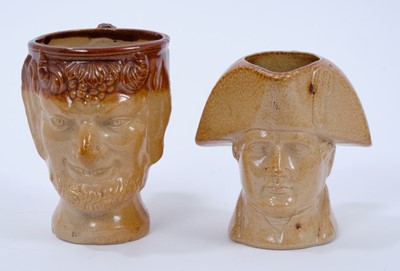 Lot 122 - 19th century salt glazed stoneware jug in the form of Napoleon, along with a similar Bacchus jug, 9.5cm and 10.5cm high