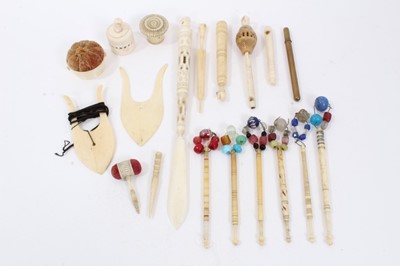 Lot 705 - Collection of six 19th century turned ivory lace bodkins, carved ivory paper knife with concealed pen, together with other ivory and bone sewing accessories
