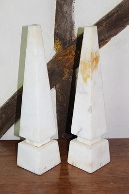 Lot 145 - Pair of marble obelisk lamp bases, on square plinths, 49cm high