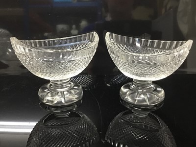 Lot 124 - Pair of good quality Edwardian cut glass salts or bon bon dishes, of boat-shaped form, on circular pedestal bases, 10cm high x 12.5cm long