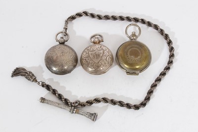 Lot 437 - Edwardian silver sovereign case of domed circular form with engraved decoration and gilded interior, (Birmingham 1907), together with a George V silver sovereign holder (Birmingham 1911)
