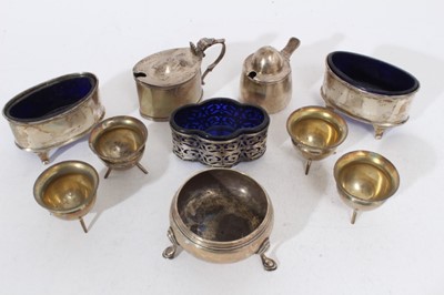 Lot 436 - Late Victorian Arts & Crafts silver mustard pot with domed hinged cover and blue glass liner (Birmingham 1899), maker Liberty & Co