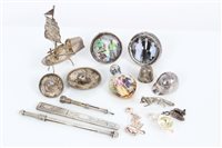 Lot 3393 - Two silver charms, silver sombrero brooch and...