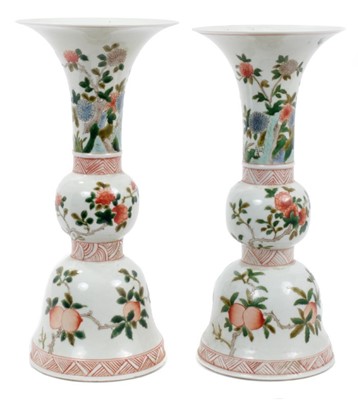 Lot 152 - Pair Chinese porcelain altar gu vases, 19th/20th century, decorated in famille verte enamels with fruit, flowers and butterflies , 23.5cm height