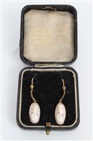Lot 3395 - Pair oval carved shell cameo earrings...