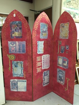 Lot 571 - Decorative three fold screen, each panel arched, decorated with mediaeval panels on puce ground with gilt stencilled borders, 168cm high