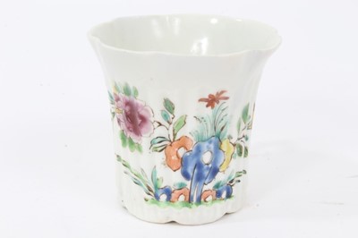 Lot 215 - An early Worcester fluted coffee can, painted in Chinese famille rose style, circa 1753-54