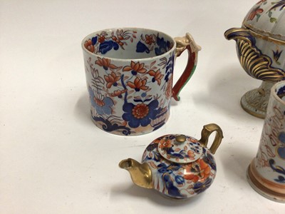 Lot 670 - Early 19th century Masons Ironstone Imari wares, including a twin handled vase, dessert tureen, mug, smaller vase, two spill vases and a miniature teapot, various marks, the large vase unmarked and...